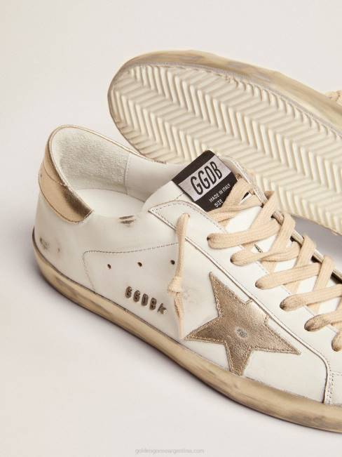 Golden Goose hombres zapatillas deportivas Super-Star con foxing dorado brillante y letras con tachuelas de metal 6846623