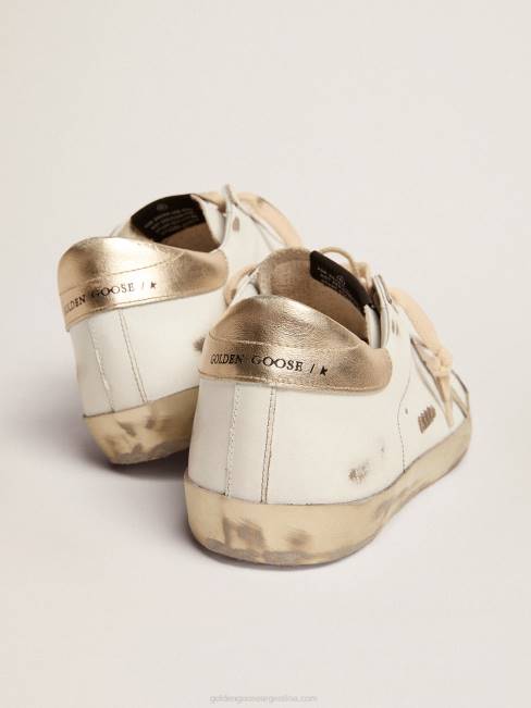 Golden Goose hombres zapatillas deportivas Super-Star con foxing dorado brillante y letras con tachuelas de metal 6846623