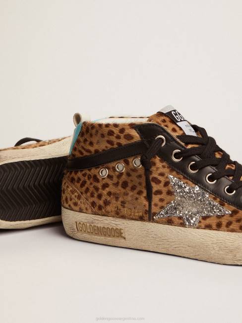 Golden Goose mujer zapatillas deportivas mid star de piel de potro animal print con estrella de purpurina plateada 6846110