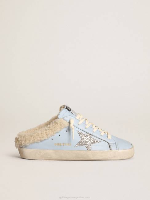 Golden Goose mujer zuecos superestrella de piel azul claro con estrella de purpurina plateada y forro de borrego beige 6846274