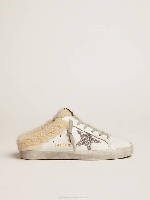 Golden Goose mujer zuecos superestrella de piel blanca con estrella de purpurina plateada y forro de borrego 6846117