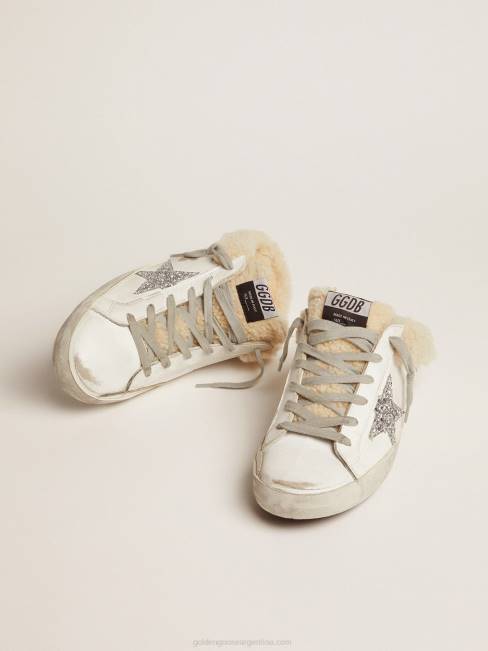 Golden Goose mujer zuecos superestrella de piel blanca con estrella de purpurina plateada y forro de borrego 6846117