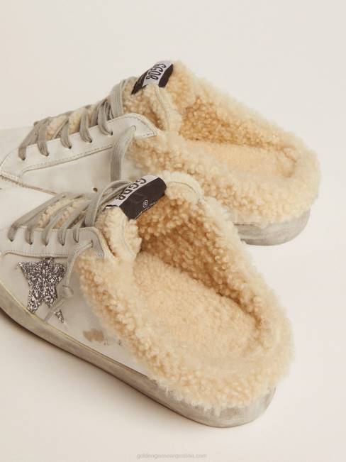 Golden Goose mujer zuecos superestrella de piel blanca con estrella de purpurina plateada y forro de borrego 6846117