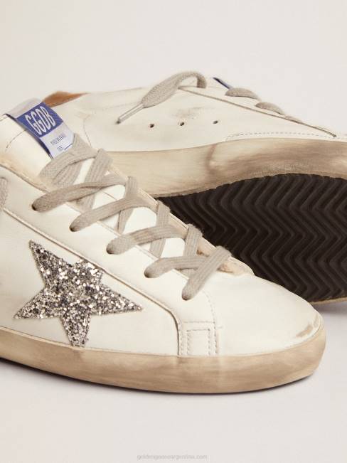 Golden Goose mujer zapatillas deportivas super-star con forro de borrego estrella plateada con purpurina y refuerzo del talón de piel gris tórtola con estampado de lagartos 684686