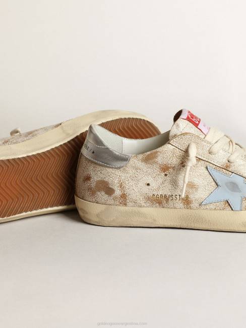 Golden Goose mujer zapatillas super-star con estrella de piel azul claro ahumado y refuerzo del talón de piel plateada metalizada 684650