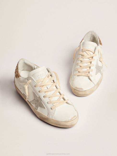 Golden Goose mujer zapatillas super-star con estrella de piel plateada con estampado de serpiente y refuerzo del talón con purpurina dorada 68466