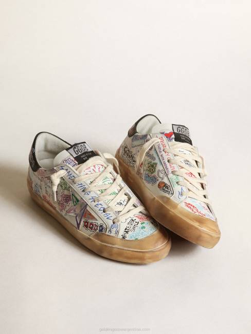 Golden Goose mujer zapatillas super-star penstar de piel blanca con letras multicolores por toda la superficie 684641